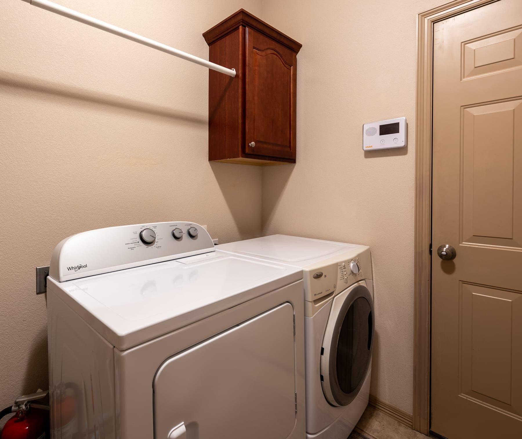 Laundry room with full-size washer and dryer